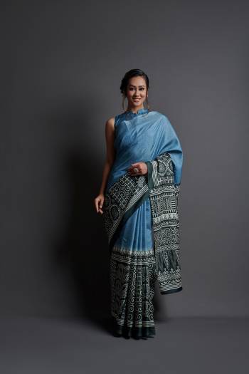 Grab This Pretty Elegant Looking Designer Party Wear Saree In Dark Color Paired With Blouse. This Saree And Blouse Are Dola Silk Based With Designer Printed Beautified Saree. Buy Now.