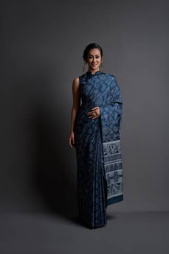 Grab This Pretty Elegant Looking Designer Party Wear Saree In Dark Color Paired With Blouse. This Saree And Blouse Are Dola Silk Based With Designer Printed Beautified Saree. Buy Now.