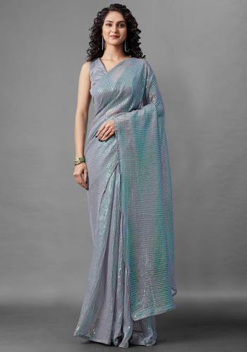 Attrective Look This Pretty Elegant Looking Designer Party Wear Saree In Grey Color Paired With Blouse. This Saree Are Georgette And Blouse Are Banglori Silk Based With Designer Sequance Embroidery Work Beautified Saree. Buy Now.