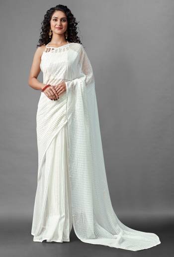 Attrective Look This Pretty Elegant Looking Designer Party Wear Saree In White Color Paired With Blouse. This Saree Are Georgette And Blouse Are Banglori Silk Based With Designer Sequance Embroidery Work Beautified Saree. Buy Now.