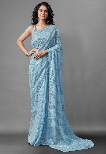 Attrective Look This Pretty Elegant Looking Designer Party Wear Saree In Sky Blue Color Paired With Blouse. This Saree Are Georgette And Blouse Are Banglori Silk Based With Designer Sequance Embroidery Work Beautified Saree. Buy Now.