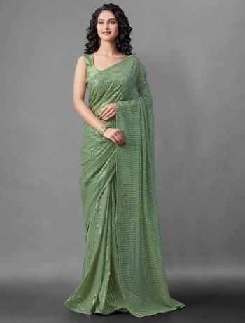 Attrective Look This Pretty Elegant Looking Designer Party Wear Saree In Pistel Green Color Paired With Blouse. This Saree Are Georgette And Blouse Are Banglori Silk Based With Designer Sequance Embroidery Work Beautified Saree. Buy Now.