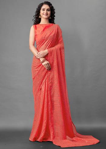 Attrective Look This Pretty Elegant Looking Designer Party Wear Saree In Tamato Red Color Paired With Blouse. This Saree Are Georgette And Blouse Are Banglori Silk Based With Designer Sequance Embroidery Work Beautified Saree. Buy Now.