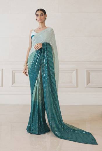 Heavy Looking This Pretty Elegant Designer Saree In Teal Color Paired With Blouse. This Saree  Are Georgette And Blouse Are Banglori Silk Based With Heavy Sequance Work Beautified Saree. Buy Now.