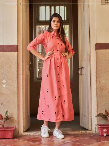 Attrective Look This Designer Readymade Long Kurti In Tamata Color Fabricated On Rayon. It Is Beautified With Digital Printed And You Can Pair This Up For A Sammer Season. Buy Now.