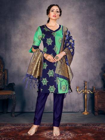 Garb This Designer Suit In Fine Light Color Paired With Dupatta. Its Heavy Wevon Designer Work Top And Dupatta Is Fabricated On Banarasi Silk Paired With Banarasi Silk Bottom. Buy this Suit Now.