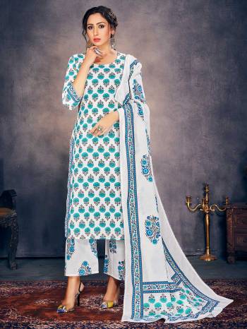 Garb This Designer Redymade Suit In Fine Light Color Paired With Dupatta. Its Designer Printed Top Is Fabricated On Cotton Paired With Cotton Bottom And Printed Cotton Dupatta. Buy this Suit Now.