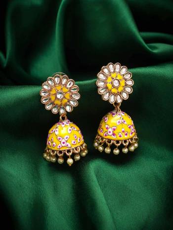 Give An Enhanced Look To Your Personality By Pairing Up This Beautiful Earring Set With Your Ethnic Attire. This Pretty Set Is In Multy Color Beautified With Stone And Pearl Zumkha Work. Buy Now.