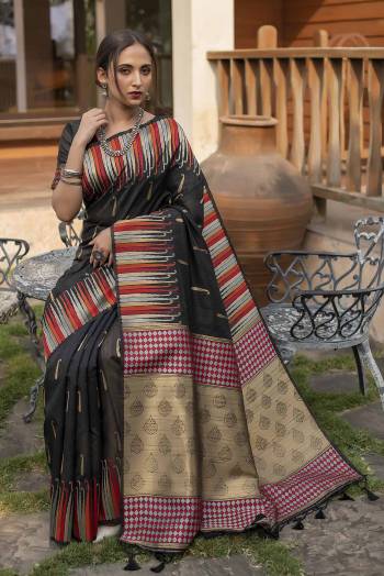 Celebrate This Festive Season And Partywear In This Very Pretty Black Colored Designer Saree Paired With Blouse. This Saree and Blouse Are Tussar Silk Based Beautified With Detailed Wevon Heavy Deasigner Work. 