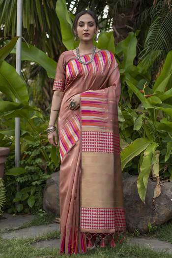 Celebrate This Festive Season And Partywear In This Very Pretty Peach Colored Designer Saree Paired With Blouse. This Saree and Blouse Are Tussar Silk Based Beautified With Detailed Wevon Heavy Deasigner Work. 