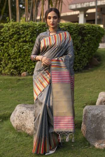 Celebrate This Festive Season And Partywear In This Very Pretty Grey Colored Designer Saree Paired With Blouse. This Saree and Blouse Are Tussar Silk Based Beautified With Detailed Wevon Heavy Deasigner Work. 