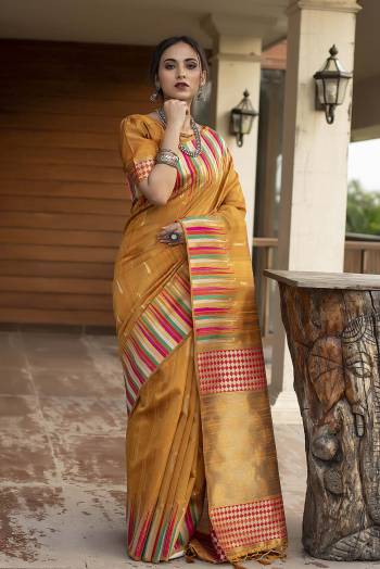 Celebrate This Festive Season And Partywear In This Very Pretty Musterd Colored Designer Saree Paired With Blouse. This Saree and Blouse Are Tussar Silk Based Beautified With Detailed Wevon Heavy Deasigner Work. 