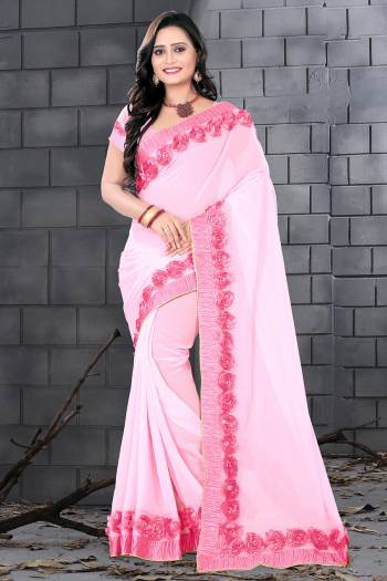 Celebrate This Festive Season And Party Wear In This Very Pretty Baby Pink Colored Designer Saree Paired With Blouse. This Saree Are Georgette and Blouse Are Banglori Silk Based Beautified With Detailed Floral,Ribbon Work. 