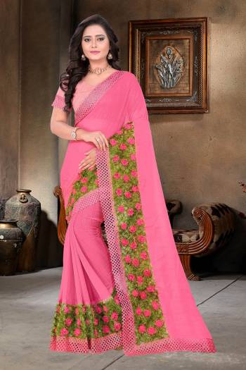 Celebrate This Festive Season And Party Wear In This Very Pretty Pink Colored Designer Saree Paired With Blouse. This Saree Are Chiffon and Blouse Are Banglori Silk Based Beautified With Detailed Floral,Ribbon Grass Work. 