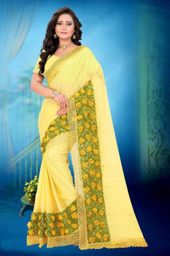 Celebrate This Festive Season And Party Wear In This Very Pretty Yellow Colored Designer Saree Paired With Blouse. This Saree Are Chiffon and Blouse Are Banglori Silk Based Beautified With Detailed Floral,Ribbon Grass Work. 