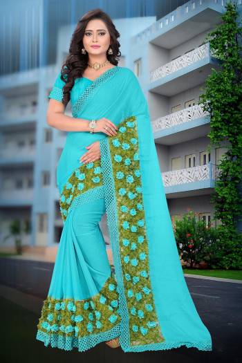 Celebrate This Festive Season And Party Wear In This Very Pretty Sky Blue Colored Designer Saree Paired With Blouse. This Saree Are Chiffon and Blouse Are Banglori Silk Based Beautified With Detailed Floral,Ribbon Grass Work. 