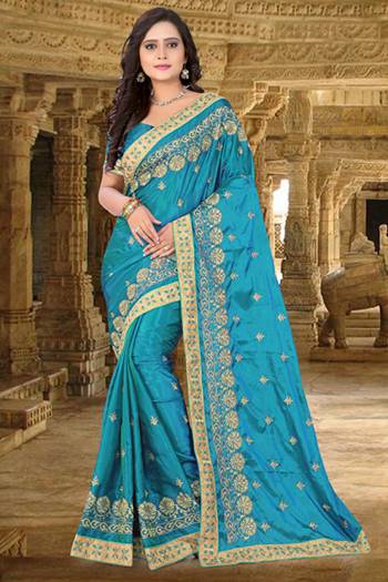 Look Attractive Wearing This Fine Color Saree Paired With Blouse.  This Heavy Designer Embroidery Saree Is Paper Silk Based Which Gives A Rich Look To Your Personality. Buy This Pretty Saree Now.