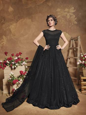 Get Ready For The Upcoming Wedding Season With This Attractive Looking Heavy Designer Floor Length Suit In Black Color. This Pretty Heavy Embroidered Suit Is Fabricated On Butterfly Net Paired With Bangal Ore Silk Bottom And Butterfly Net Fabricated Dupatta. Its Bright Color And Heavy Embroidery Will Give An Attractive Look To Your Personality.