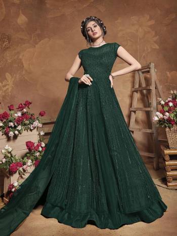 Get Ready For The Upcoming Wedding Season With This Attractive Looking Heavy Designer Floor Length Suit In Green Color. This Pretty Heavy Embroidered Suit Is Fabricated On Butterfly Net Paired With Bangal Ore Silk Bottom And Butterfly Net Fabricated Dupatta. Its Bright Color And Heavy Embroidery Will Give An Attractive Look To Your Personality.