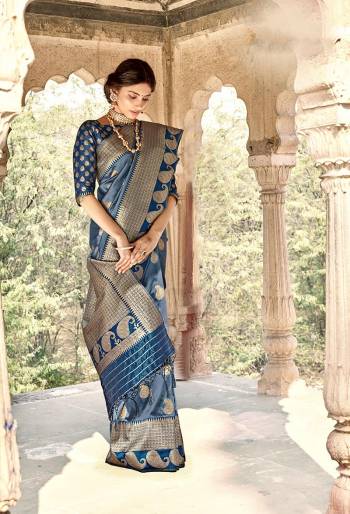 Rich Look This Pretty Elegant Looking Designer Party Wear Saree In Fine Light Color Paired With Blouse. This Saree Are Banarasi Silk And Blouse Are Banarasi Silk With Hand Wevon Designer Work Saree And Blouse Beautified Saree. Buy Now.