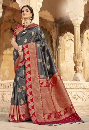 Rich Look This Pretty Elegant Looking Designer Party Wear Saree In Fine Light Color Paired With Blouse. This Saree Are Banarasi Silk And Blouse Are Banarasi Silk With Hand Wevon Designer Work Saree And Blouse Beautified Saree. Buy Now.