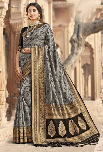 Rich Look This Pretty Elegant Looking Designer Party Wear Saree In Fine Light Color Paired With Blouse. This Saree Are Banarasi Silk And Blouse Are Banarasi Silk With Hand Wevon Designer Work Saree And Blouse Beautified Saree. Buy Now.