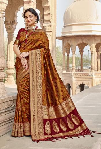 Rich Look This Pretty Elegant Looking Designer Party Wear Saree In Fine Light Color Paired With Blouse. This Saree Are Banarasi Silk And Blouse Are Banarasi Silk With Hand Wevon Designer Work Saree And Blouse Beautified Saree. Buy Now.