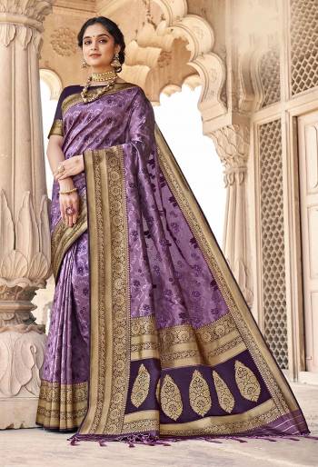 Rich Look This Pretty Elegant Looking Designer Party Wear Saree In Fine Light Color Paired With Blouse. This Saree Are Banarasi Silk And Blouse Are Banarasi Silk With Hand Wevon Designer Work Saree And Blouse Beautified Saree. Buy Now.