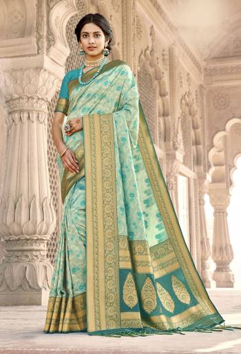 Rich Look This Pretty Elegant Looking Designer Party Wear Saree In Fine Light Color Paired With Blouse. This Saree Are Banarasi Silk And Blouse Are Banarasi Silk With Hand Wevon Designer Work Saree And Blouse Beautified Saree. Buy Now.