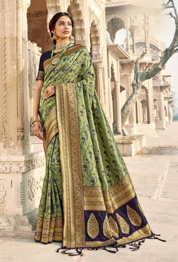 Rich Look This Pretty Elegant Looking Designer Party Wear Saree In Fine Light Color Paired With Blouse. This Saree Are Banarasi Silk And Blouse Are Banarasi Silk With Hand Wevon Designer Work Saree And Blouse Beautified Saree. Buy Now.