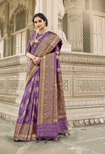 Rich Look This Pretty Elegant Looking Designer Party Wear Saree In Fine Light Color Paired With Blouse. This Saree Are Banarasi Silk And Blouse Are Banarasi Silk With Hand Wevon Designer Work Saree And Blouse Beautified Saree. Buy Now.