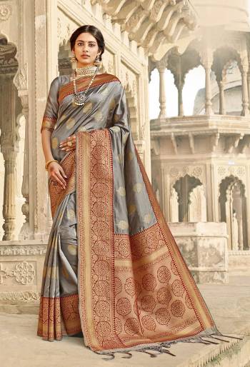 Rich Look This Pretty Elegant Looking Designer Party Wear Saree In Fine Light Color Paired With Blouse. This Saree Are Banarasi Silk And Blouse Are Banarasi Silk With Hand Wevon Designer Work Saree And Blouse Beautified Saree. Buy Now.