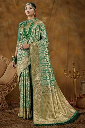 Garb This Pretty Elegant Looking Designer Party Wear Saree In Fine Light Color Paired With Blouse. This Saree Are Banarasi Silk And Blouse Are Banarasi Silk With Wevon Designer Work Saree And Blouse Beautified Saree. Buy Now.