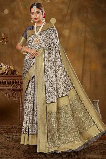 Garb This Pretty Elegant Looking Designer Party Wear Saree In Fine Light Color Paired With Blouse. This Saree Are Banarasi Silk And Blouse Are Banarasi Silk With Wevon Designer Work Saree And Blouse Beautified Saree. Buy Now.