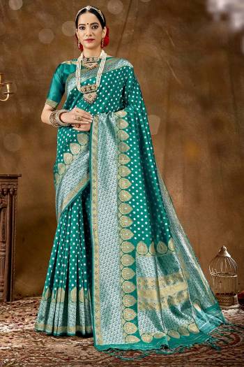 Garb This Pretty Elegant Looking Designer Party Wear Saree In Fine Light Color Paired With Blouse. This Saree Are Banarasi Silk And Blouse Are Banarasi Silk With Wevon Designer Work Saree And Blouse Beautified Saree. Buy Now.