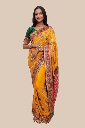 Celebrate This Festive Season In This Very Pretty Patola Designer Saree Paired With Contrasting Blouse. This Saree Are Soft Silk and Blouse Are Fentam Silk Based Beautified With Detailed Heavy Embroidery With Diamond Work And Latkan. 