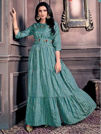 Flaunt Your Rich And Elegant Taste Wearing This Designer Readymade Long Gown In Teal Color. This  Pretty Gown Is Fabricated On Wevon Jari Chanderi Beautified With Hand Thread Work. Its Fabric Is Soft Towards Skin And Easy To Carry All Day Long. 