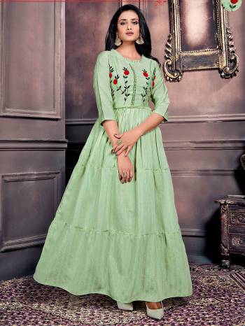 Flaunt Your Rich And Elegant Taste Wearing This Designer Readymade Long Gown In Pista Color. This  Pretty Gown Is Fabricated On Wevon Jari Chanderi Beautified With Hand Thread Work. Its Fabric Is Soft Towards Skin And Easy To Carry All Day Long. 