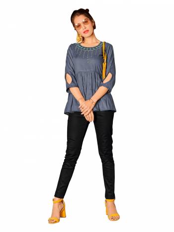 Look This Readymade Short Kurti In Fine Color Fabricated On Rayon Beautified With Hand Embroidery Work. It Is Light In Weight And Easy To Carry All Day Long. 