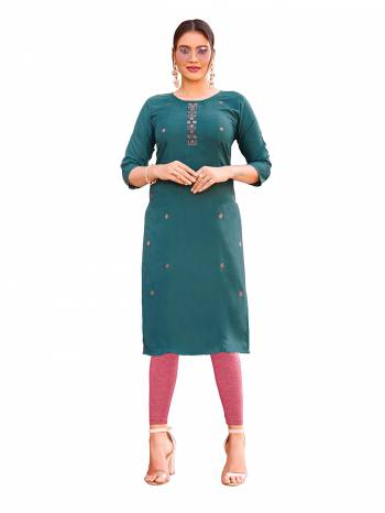 Attrective Look This Readymade Kurti In Fine Color Fabricated On Ruby Slub Beautified With Embroidery Work. It Is Light In Weight And Easy To Carry All Day Long. 