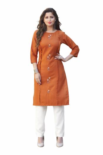 Attrective Look This Readymade Kurti In Fine Color Fabricated On Ruby Slub Beautified With Embroidery Work. It Is Light In Weight And Easy To Carry All Day Long. 