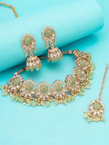 Give An Enhanced Look To Your Personality By Pairing Up This Beautiful Nacklace Set With Your Ethnic Attire. This Pretty Set Is In Multi Color Beautified With Kundan Work. Buy Now.