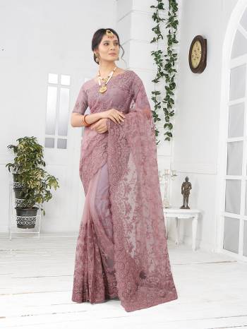 Adorn The Pretty Angelic Look Wearing This Party Wear Heavy Designer  Embroidery,Zarkan Stone Work Saree With Blouse. This Saree Is Fabricated On Net Paired With Blouse. Its Pretty Color Pallete Will Give An Attractive Look To Your Personality. 