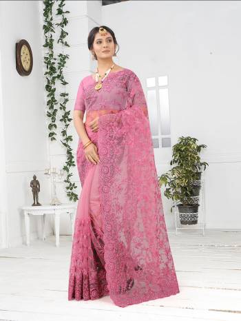 Adorn The Pretty Angelic Look Wearing This Party Wear Heavy Designer  Embroidery,Zarkan Stone Work Saree With Blouse. This Saree Is Fabricated On Net Paired With Blouse. Its Pretty Color Pallete Will Give An Attractive Look To Your Personality. 