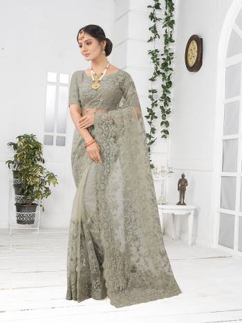 Adorn The Pretty Angelic Look Wearing This Party Wear Heavy Designer  Embroidery,Zarkan Stone Work Saree With Blouse. This Saree Is Fabricated On Net Paired With Blouse. Its Pretty Color Pallete Will Give An Attractive Look To Your Personality. 