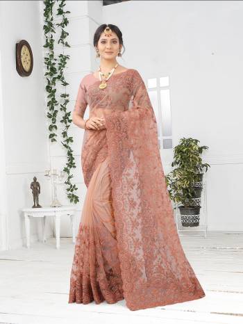 Adorn The Pretty Angelic Look Wearing This Party Wear Heavy Designer  Embroidery,Zarkan Stone Work Saree With Blouse. This Saree Is Fabricated On Net Paired With Blouse. Its Pretty Color Pallete Will Give An Attractive Look To Your Personality. 