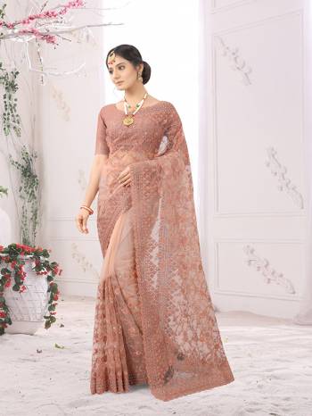 Adorn The Pretty Angelic Look Wearing This Party Wear Heavy Designer  Embroidery,Zarkan Stone Work Saree With Blouse. This Saree Is Fabricated On Net Paired With Blouse. Its Pretty Color Pallete Will Give An Attractive Look To Your Personality. 