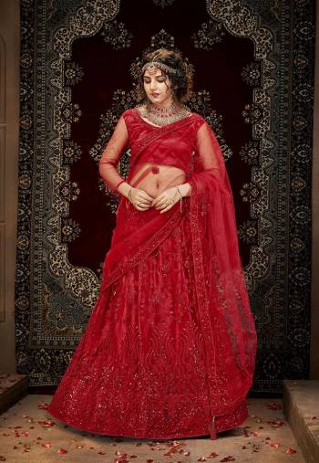 Garb This Heavy Designer Lehenga Choli In All Red Color. This Heavy Embroidered Work Lehenga Choli Is Net Based Paired With Net Fabricated Dupatta, It Is Beautified With Lovely Detailed Multy,Sequance Embroidery Work Giving An Attractive Look.