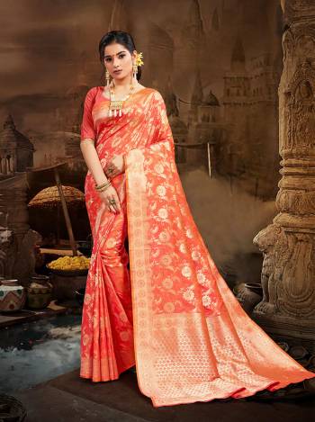 Celebrate This Festive Season And Partywear In This Very Pretty Orange Colored Designer Saree Paired With Blouse. This Saree and Blouse Are Silk Based Beautified With Detailed Wevon Heavy Deasigner Work. 