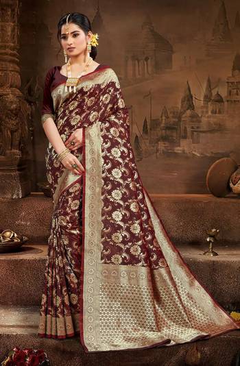 Celebrate This Festive Season And Partywear In This Very Pretty Brown Colored Designer Saree Paired With Blouse. This Saree and Blouse Are Silk Based Beautified With Detailed Wevon Heavy Deasigner Work. 